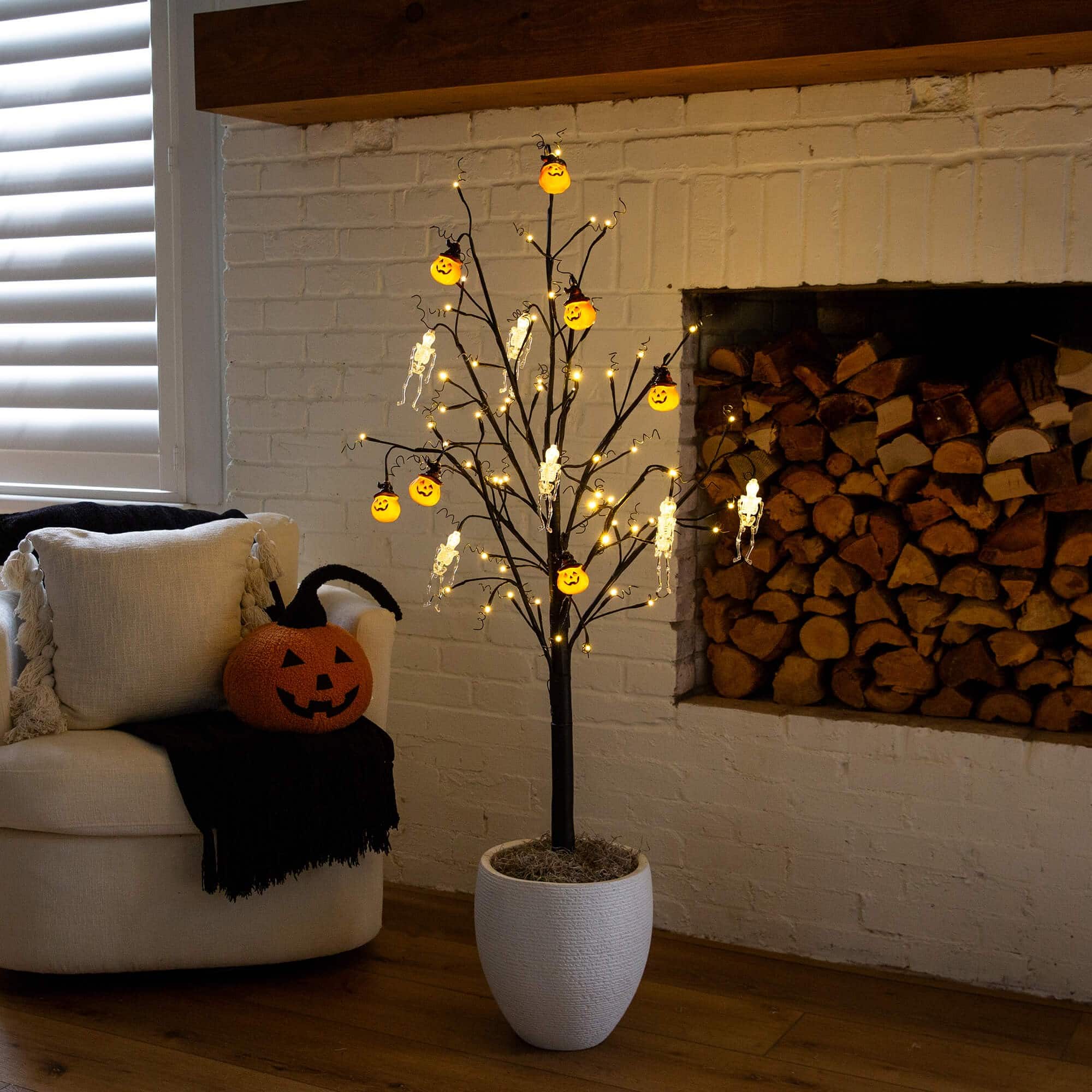 5ft. Pre-Lit Artificial Halloween Pumpkins and Skulls Ornament Tree with 72 Warm White LED Lights